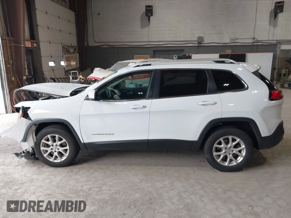 2014 Jeep Cherokee Altitude with VIN 1C4PJMCB7EW186432, listed as a IAAI auction lot 42076018 with 150,186 mi miles and . Bid and sale history available at DreamBid. Image 14.