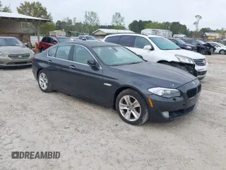 2012 BMW 5 Series 528i with VIN WBAXG5C58CDW24671, listed as a IAAI auction lot 41917583 with 167,098 mi miles. Bid and sale history available at carsss.com. Image 1.