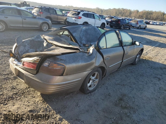 2001 Pontiac Bonneville SE z VIN 1G2HX54K314206208, wystawiony jako Copart lot #75285534 z przebiegiem Nie podano mil oraz Szkoda całkowita • Salvage title. Historia ofert i sprzedaży dostępna na DreamBid. Obrazek 3.