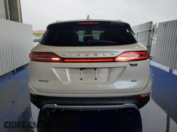 2015 Lincoln MKC with VIN 5LMCJ1A99FUJ41320, listed as a Copart auction lot 55824245 with 203,098 mi miles and Clean Title. Bid and sale history available at DreamBid. Image 6.