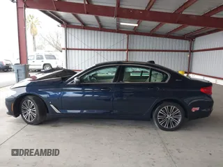 2019 BMW 5 Series 530e with VIN WBAJA9C50KB254535, listed as a IAAI auction lot 41094049 with 57,874 mi miles and . Bid and sale history available at DreamBid. Image 14.