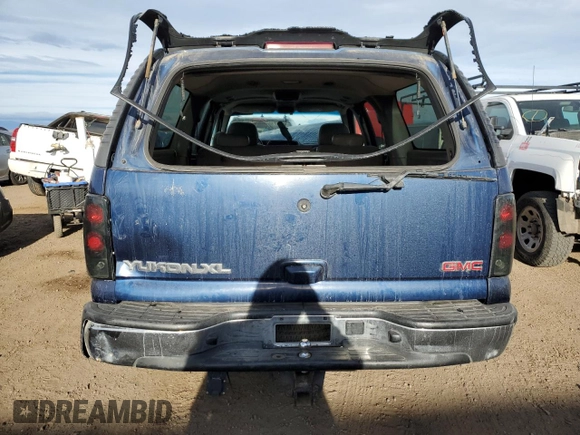 2002 GMC Yukon XL SLT z VIN 1GKFK16ZX2J232476, wystawiony jako Copart lot #50203045 z przebiegiem 285 792 mil mil oraz Szkody całkowita. Historia ofert i sprzedaży dostępna na DreamBid. Obrazek 6.