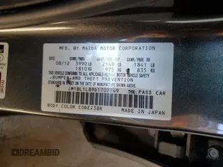 2013 Mazda 3 i Touring with VIN JM1BL1L89D1707749, listed as a Copart auction lot 76125384 with 139,966 mi miles and Salvage title. Bid and sale history available at DreamBid. Image 12.
