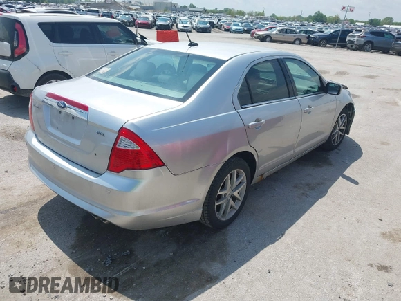 2012 Ford Fusion SEL with VIN 3FAHP0JA9CR200052, listed as a IAAI auction lot 42115789 with 141,963 mi miles and . Bid and sale history available at DreamBid. Image 4.