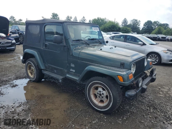 2003 Jeep Wrangler Sahara with VIN 1J4FA59S73P308250, listed as a Copart auction lot 64305965 with 186,288 mi miles and Clean title. Bid and sale history available at DreamBid. Image 4.