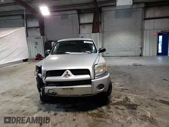 2007 Mitsubishi Raider LS z VIN 1Z7HT28KX7S216386, wystawiony jako Copart lot #88034315 z przebiegiem 162 337 mil mil oraz Czysty tytuł • Clean title. Historia ofert i sprzedaży dostępna na DreamBid. Obrazek 10.