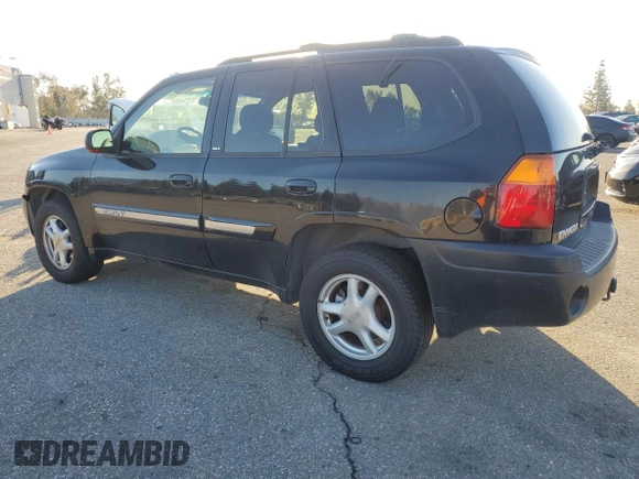 2002 GMC Envoy SLT with VIN 1GKDS13S522485892, listed as a Copart auction lot 49248615 with 152,326 mi miles and Salvage Title. Bid and sale history available at carsss.com. Image 2.