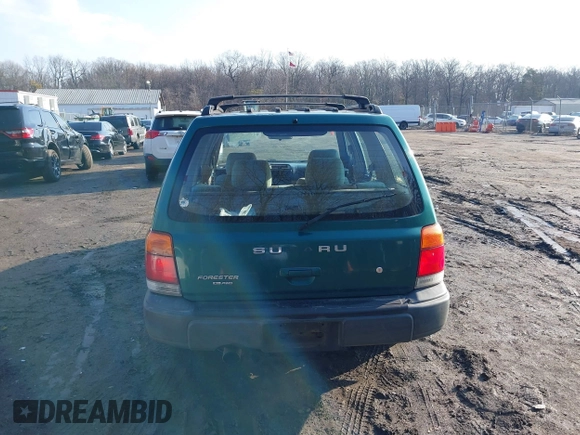 1999 Subaru Forester L with VIN JF1SF635XXH735202, listed as a IAAI auction lot 41489355 with 290,000 mi miles. Bid and sale history available at carsss.com. Image 16.