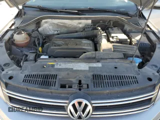 2015 Volkswagen Tiguan S z VIN WVGAV7AX6FW568958, wystawiony jako Copart lot #56716525 z przebiegiem 100 839 mil mil oraz Szkoda całkowita • Salvage title. Historia ofert i sprzedaży dostępna na DreamBid. Obrazek 11.