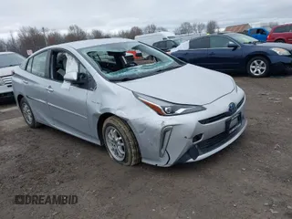 2021 Toyota Prius LE z VIN JTDL9MFU4M3028389, wystawiony jako IAAI lot #41800573 z przebiegiem 32 623 mil mil oraz . Historia ofert i sprzedaży dostępna na DreamBid. Obrazek 1.