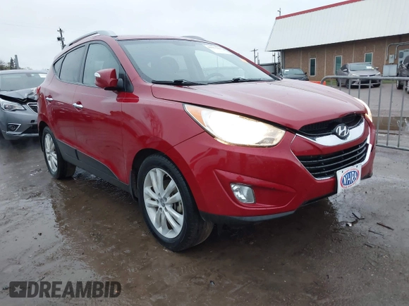 2013 Hyundai Tucson GLS with VIN KM8JU3AC8DU683546, listed as a IAAI auction lot 41956167 with 141,510 mi miles. Bid and sale history available at carsss.com. Image 1.