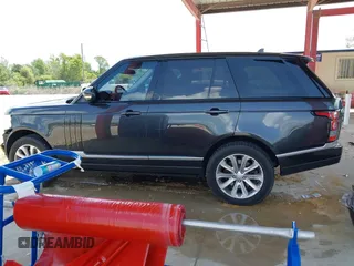2016 Land Rover Range Rover HSE z VIN SALGS2PFXGA313164, wystawiony jako IAAI lot #42362077 z przebiegiem 35 609 mil mil oraz . Historia ofert i sprzedaży dostępna na DreamBid. Obrazek 15.