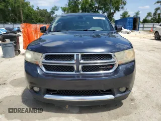 2013 Dodge Durango Crew with VIN 1C4SDHDT3DC679153, listed as a Copart auction lot 54472645 with 167,068 mi miles and Salvage Title. Bid and sale history available at DreamBid. Image 5.