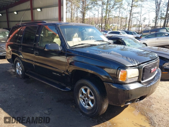 2000 GMC Denali with VIN 1GKEK13R1YR129862, listed as a IAAI auction lot 41833054 with 223,811 mi miles. Bid and sale history available at carsss.com. Image 1.