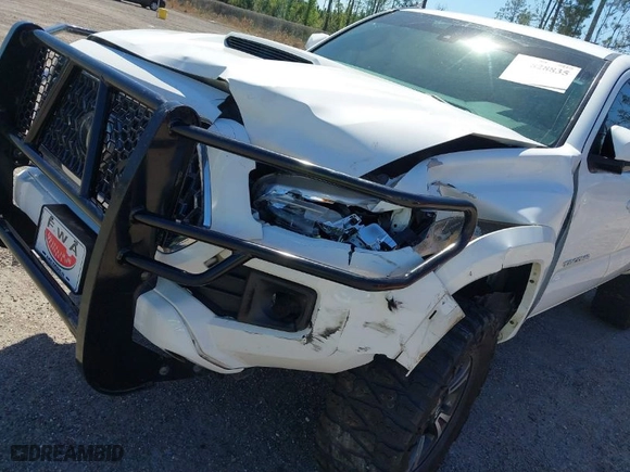 2019 Toyota Tacoma 4WD SR with VIN 3TMCZ5AN6KM229597, listed as a IAAI auction lot 41828835 with 134,907 mi miles. Bid and sale history available at carsss.com. Image 6.