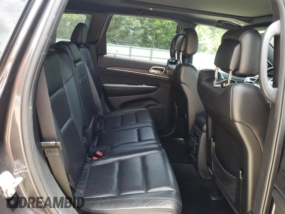 2018 Jeep Grand Cherokee Limited z VIN 1C4RJEBG9JC159384, wystawiony jako Copart lot #59882585 z przebiegiem 130 089 mil mil oraz Szkoda całkowita • Salvage title. Historia ofert i sprzedaży dostępna na DreamBid. Obrazek 11.
