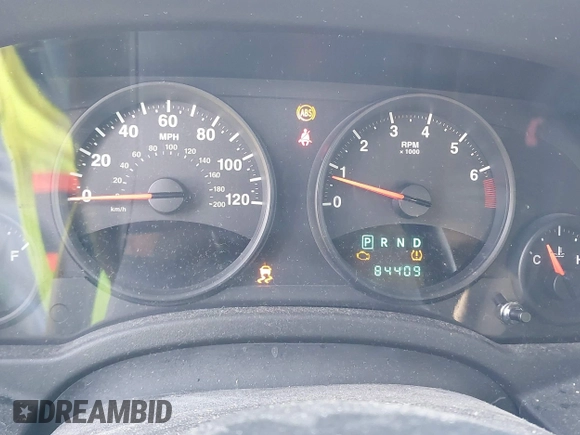 2011 Jeep Compass with VIN 1J4NT1FA4BD213994, listed as a IAAI auction lot 42020375 with 84,409 mi miles. Bid and sale history available at carsss.com. Image 7.