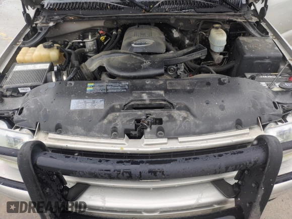 2004 Chevrolet Suburban Z71 z VIN 3GNFK16Z44G305168, wystawiony jako Copart lot #53900955 z przebiegiem 186 770 mil mil oraz Szkoda całkowita • Salvage title. Historia ofert i sprzedaży dostępna na DreamBid. Obrazek 12.
