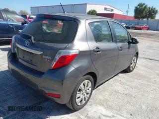 2014 Toyota Yaris L with VIN JTDKTUD35ED596329, listed as a IAAI auction lot 41705004 with 191,557 mi miles. Bid and sale history available at carsss.com. Image 4.
