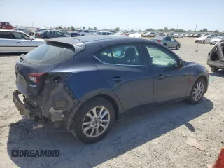 2015 Mazda 3 i Grand Touring z VIN 3MZBM1M72FM145070, wystawiony jako Copart lot #58419525 z przebiegiem 61 255 mil mil oraz Szkoda całkowita • Salvage title. Historia ofert i sprzedaży dostępna na DreamBid. Obrazek 3.