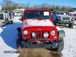 2018 Jeep Wrangler JK Unlimited Sport with VIN 1C4BJWDG9JL874850, listed as a IAAI auction lot 41482613 with 80,669 mi miles. Bid and sale history available at carsss.com. Image 12.