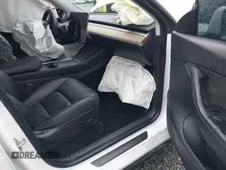 2022 Tesla Model Y Long Range z VIN 7SAYGDEE6NF451259, wystawiony jako IAAI lot #41200775 z przebiegiem 59 683 mil mil oraz . Historia ofert i sprzedaży dostępna na DreamBid. Obrazek 5.