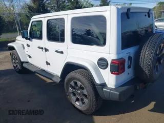 2018 Jeep Wrangler Unlimited Sahara z VIN 1C4HJXEG9JW227829, wystawiony jako IAAI lot #42099356 z przebiegiem 130 259 mil mil oraz . Historia ofert i sprzedaży dostępna na DreamBid. Obrazek 3.