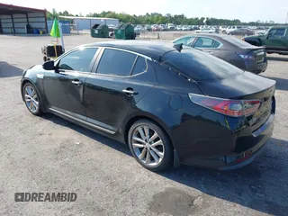 2015 Kia Optima EX with VIN KNAGN4AD7F5090393, listed as a IAAI auction lot 42632332 with 205,227 mi miles and . Bid and sale history available at DreamBid. Image 3.