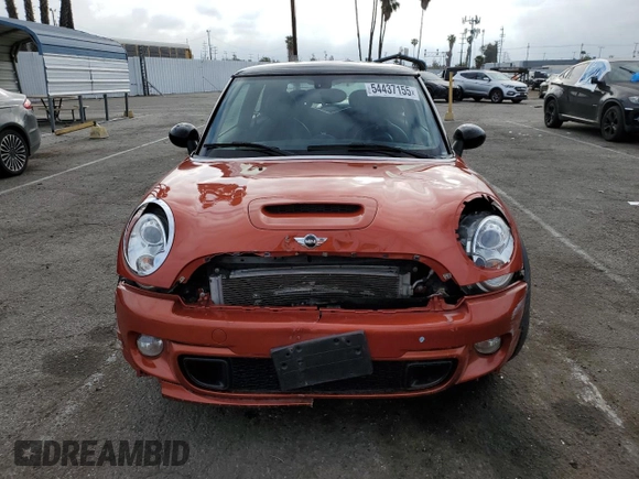 2013 MINI Hardtop S with VIN WMWSV3C57DT477948, listed as a Copart auction lot 54437155 with 63,114 mi miles and Salvage Title. Bid and sale history available at DreamBid. Image 5.