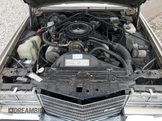 1985 Cadillac Eldorado z VIN 1G6EL5788FE655155, wystawiony jako Copart lot #73223134 z przebiegiem 68 676 mil mil oraz Tytuł czysty. Historia ofert i sprzedaży dostępna na DreamBid. Obrazek 11.