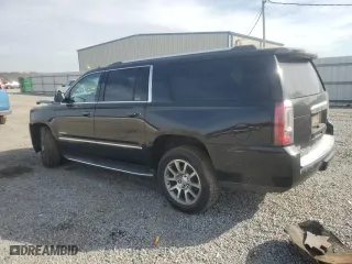 2020 GMC Yukon XL Denali with VIN 1GKS1HKJ0LR182572, listed as a Copart auction lot 80741994 with 107,195 mi miles and Salvage Title. Bid and sale history available at carsss.com. Image 2.