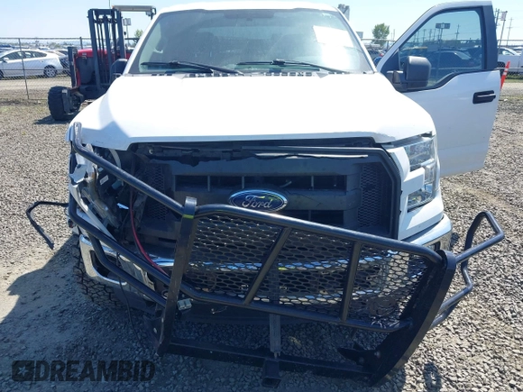 2015 Ford F-150 XLT z VIN 1FTEW1EPXFKE20880, wystawiony jako IAAI lot #42034493 z przebiegiem 152 588 mil mil oraz . Historia ofert i sprzedaży dostępna na DreamBid. Obrazek 6.
