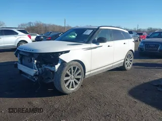 2018 Land Rover Range Rover Velar R-Dynamic HSE with VIN SALYM2RV5JA749821, listed as a IAAI auction lot 41387599 with 119,485 mi miles and . Bid and sale history available at DreamBid. Image 2.