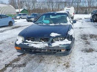 1999 Acura CL Premium z VIN 19UYA2250XL006640, wystawiony jako IAAI lot #41393749 z przebiegiem 77 308 mil mil oraz . Historia ofert i sprzedaży dostępna na DreamBid. Obrazek 6.