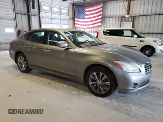 2013 Infiniti M37 with VIN JN1BY1AR2DM602789, listed as a Copart auction lot 68795164 with 122,533 mi miles and Salvage Title. Bid and sale history available at carsss.com. Image 4.