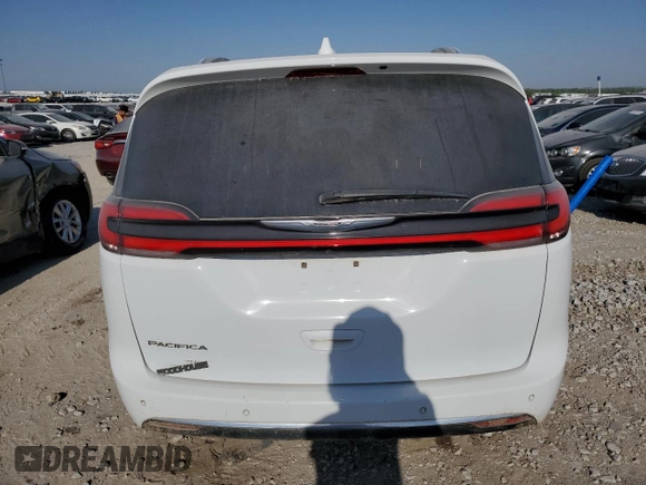 2021 Chrysler Pacifica Touring L with VIN 2C4RC1BG2MR574402, listed as a Copart auction lot 88883045 with Not provided miles and Salvage title. Bid and sale history available at DreamBid. Image 6.