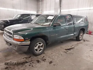 2000 Dodge Dakota with VIN 1B7GL22X4YS628395, listed as a IAAI auction lot 41241161 with 183,374 mi miles. Bid and sale history available at carsss.com. Image 2.