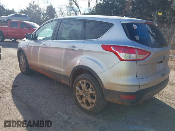 2013 Ford Escape SEL with VIN 1FMCU9H92DUD87086, listed as a IAAI auction lot 41614977 with 100,478 mi miles and . Bid and sale history available at DreamBid. Image 3.