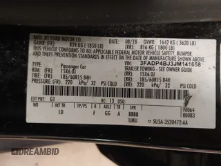 2018 Ford Fiesta SE z VIN 3FADP4BJ3JM141658, wystawiony jako IAAI lot #41737201 z przebiegiem 92 078 mil mil oraz . Historia ofert i sprzedaży dostępna na DreamBid. Obrazek 9.