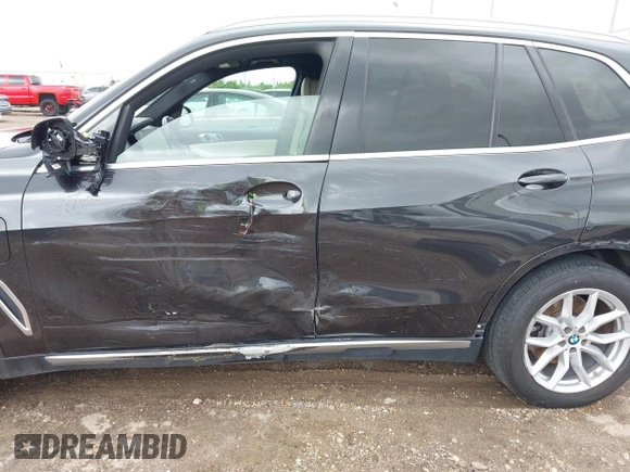 2021 BMW X5 xDrive45e with VIN 5UXTA6C02M9F88978, listed as a IAAI auction lot 42201563 with 23,339 mi miles and . Bid and sale history available at DreamBid. Image 6.