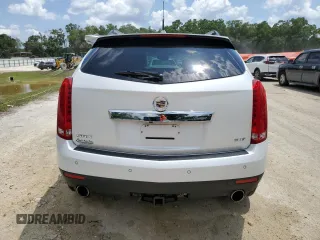 2014 Cadillac SRX Luxury Collection z VIN 3GYFNBE30ES685072, wystawiony jako Copart lot #58122705 z przebiegiem 128 013 mil mil oraz Szkoda całkowita • Salvage title. Historia ofert i sprzedaży dostępna na DreamBid. Obrazek 6.