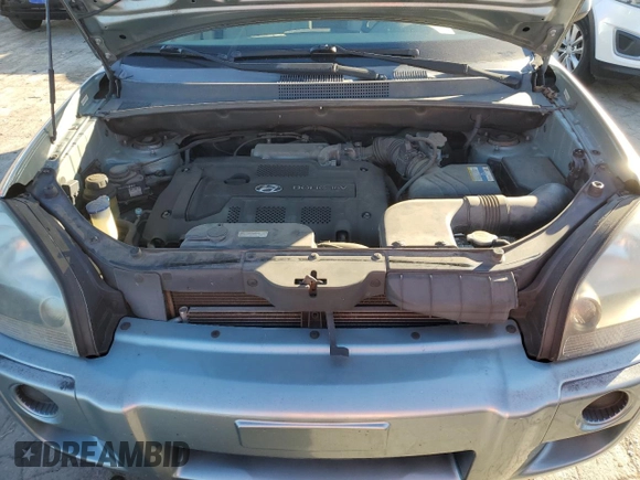 2008 Hyundai Tucson GLS with VIN KM8JM12B38U755186, listed as a Copart auction lot 77097104 with 209,714 mi miles and Salvage Title. Bid and sale history available at carsss.com. Image 12.