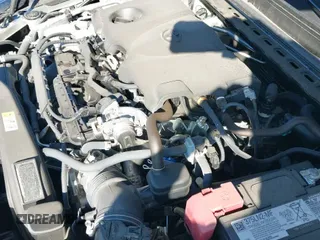 2023 Toyota Camry LE z VIN 4T1R11AK2PU828477, wystawiony jako IAAI lot #43449545 z przebiegiem 8 235 mil mil oraz . Historia ofert i sprzedaży dostępna na DreamBid. Obrazek 19.