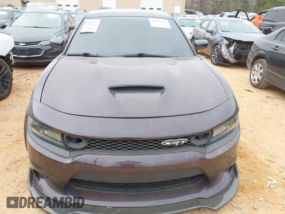 2021 Dodge Charger Scat Pack Widebody with VIN 2C3CDXGJ5MH579324, listed as a IAAI auction lot 41399676 with 77,156 mi miles and . Bid and sale history available at DreamBid. Image 12.