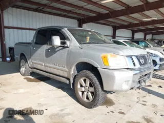 2011 Nissan Titan SL with VIN 1N6AA0EC7BN306488, listed as a IAAI auction lot 41413618 with 102,465 mi miles. Bid and sale history available at carsss.com. Image 1.