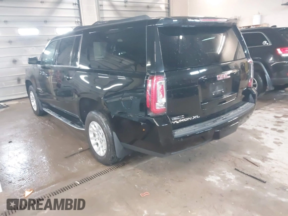 2017 GMC Yukon XL SLT with VIN 1GKS2GKC9HR320853, listed as a IAAI auction lot 41935263 with 83,985 mi miles. Bid and sale history available at carsss.com. Image 3.