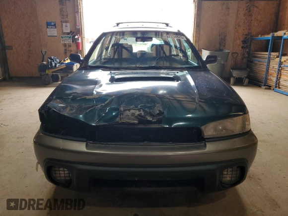 1999 Subaru Legacy Outback with VIN 4S3BG685XX7634327, listed as a Copart auction lot 57334825 with 125,342 mi miles and Clean title. Bid and sale history available at DreamBid. Image 5.