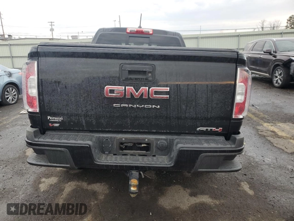 2022 GMC Canyon 4WD AT4 w/Cloth with VIN 1GTG6FEN7N1293630, listed as a Copart auction lot 89400665 with 19,261 mi miles and Salvage Title. Bid and sale history available at carsss.com. Image 6.
