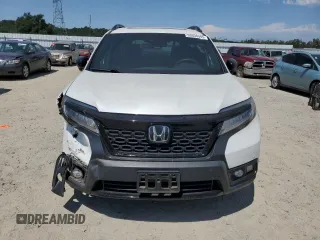 2021 Honda Passport Elite with VIN 5FNYF8H03MB007617, listed as a Copart auction lot 63036345 with 21,757 mi miles and Salvage title. Bid and sale history available at DreamBid. Image 5.