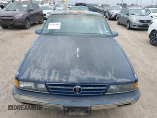 1990 Pontiac Bonneville z VIN 1G2HX54C6L1204370, wystawiony jako IAAI lot #42283309 z przebiegiem 114 427 mil mil oraz . Historia ofert i sprzedaży dostępna na DreamBid. Obrazek 12.